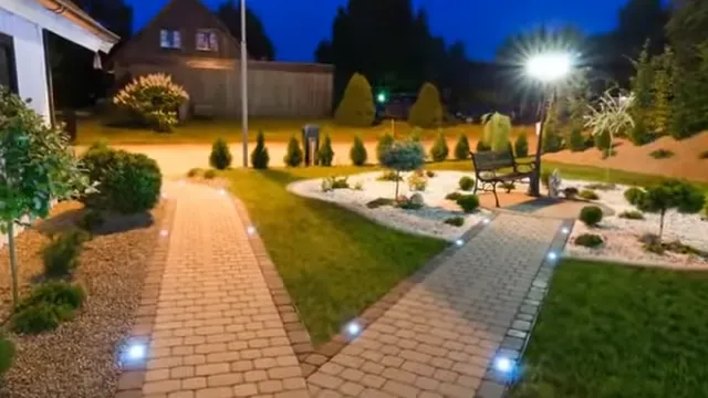 Landscape Lighting Charlotte project showing a beautifully lit home exterior, walkway, and garden with professional outdoor lighting design.